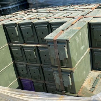 50 cal ammo cans stacked on pallets